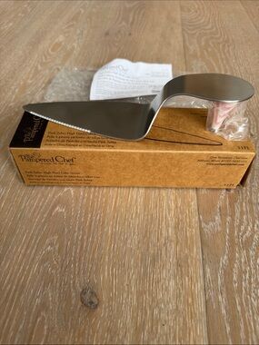 Pampered Chef Stainless Steel Pink Zebra High Heel Cake Server. New/never used.